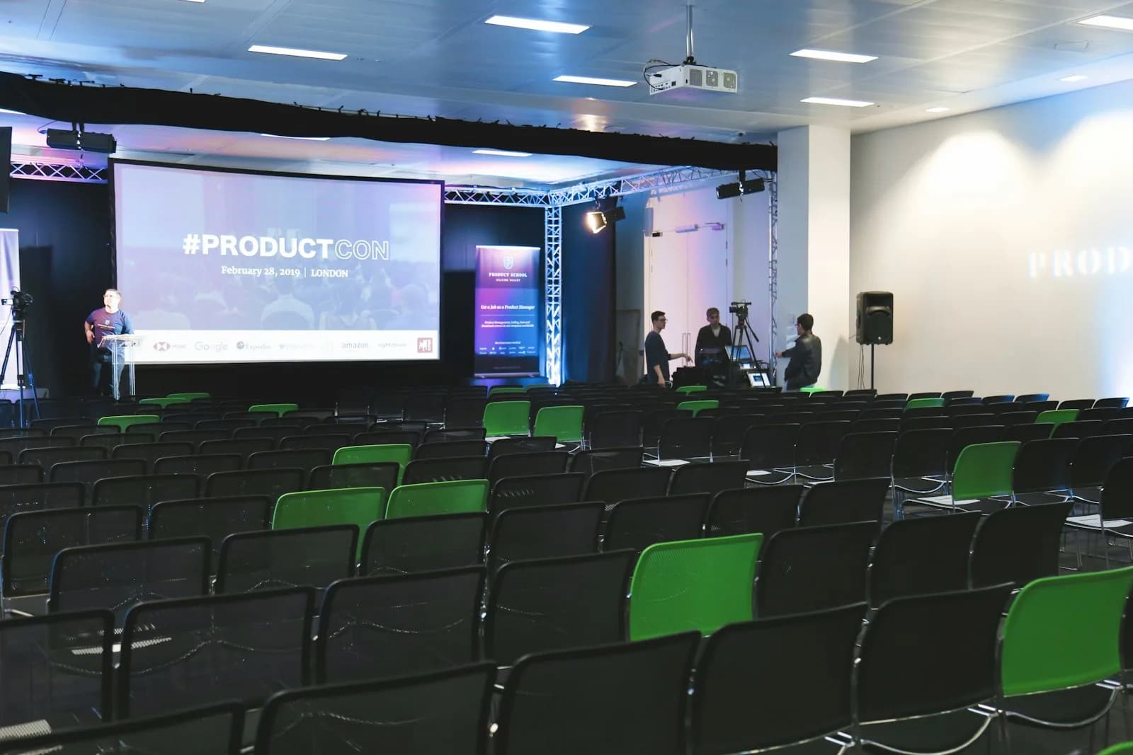 A speaker addressing delegates at a business conference